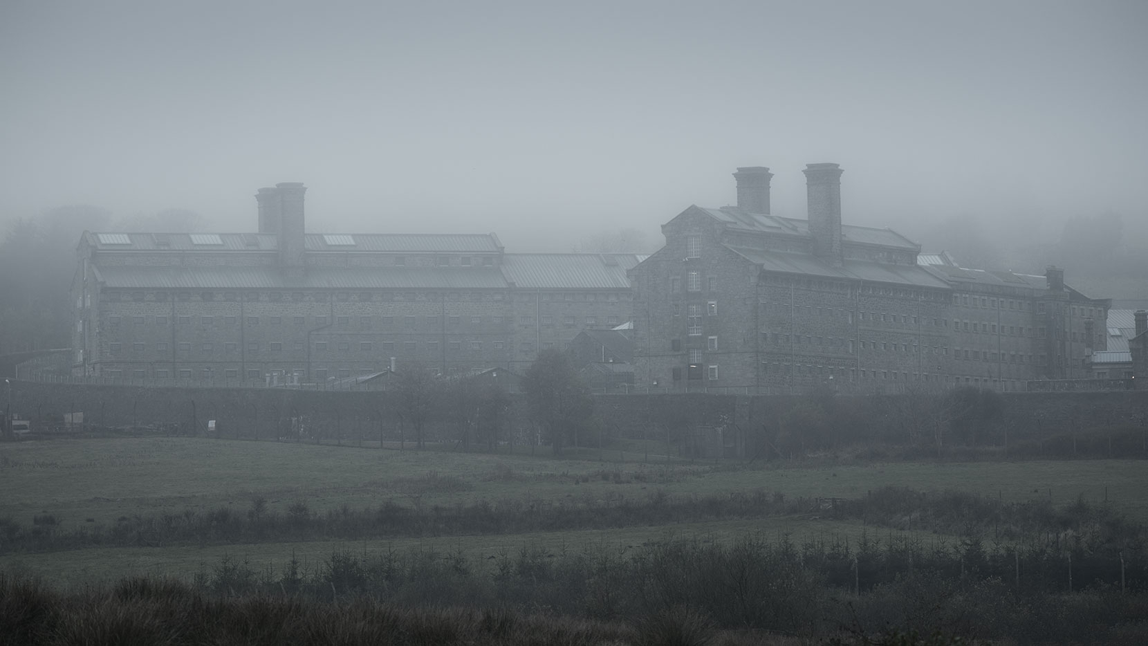 Norman Stanley Fletcher - you are hereby sentenced to five years... industrial and menacing, Dartmoor Prison is fearful place in the fog.
