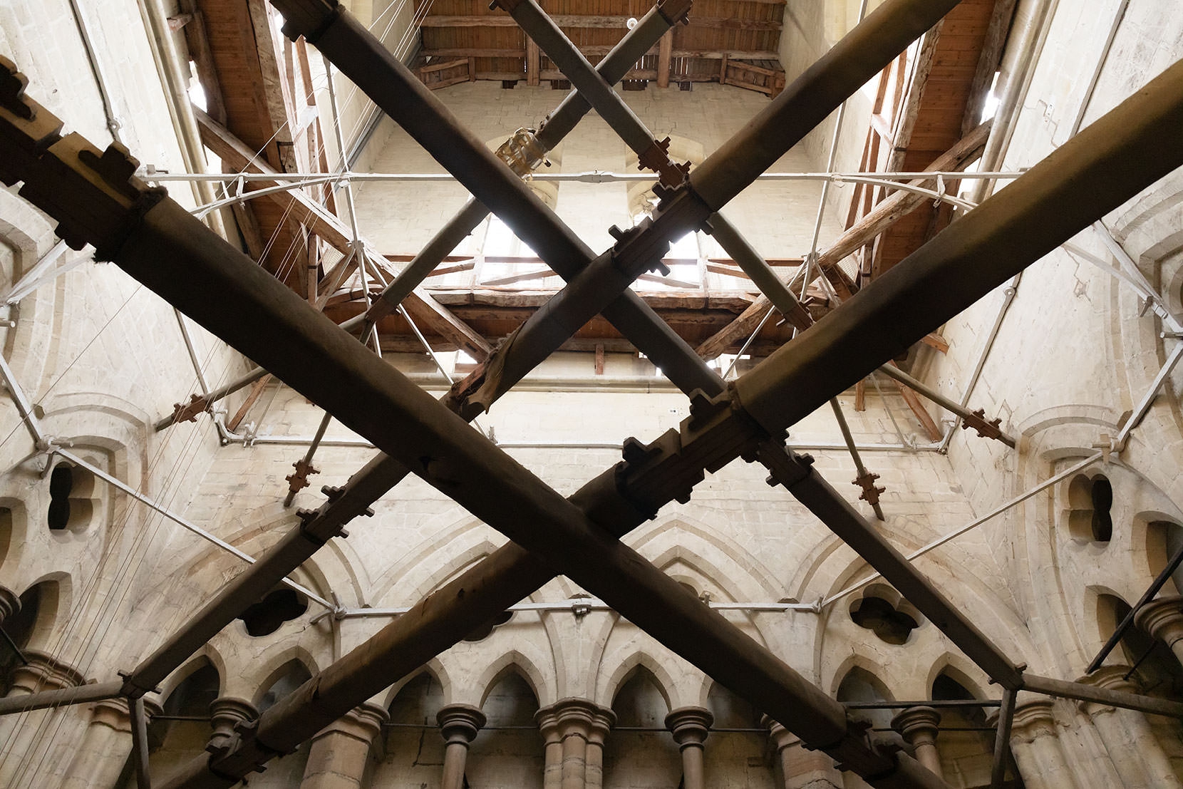 Vintage cross bracing... the lighter metal is from the 14th Century, the huge props are from the Victorian era 